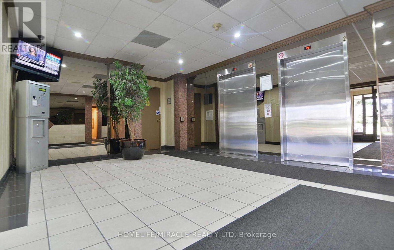 404 - 10 Markbrook Lane, Toronto, Ontario  M9V 5E3 - Photo 2 - W12420182
