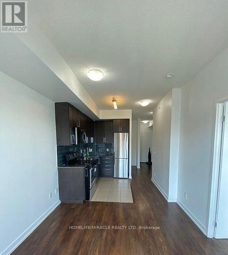 312 - 840 Queens Plate Drive, Toronto, Ontario  M9W 6Z3 - Photo 2 - W12420192
