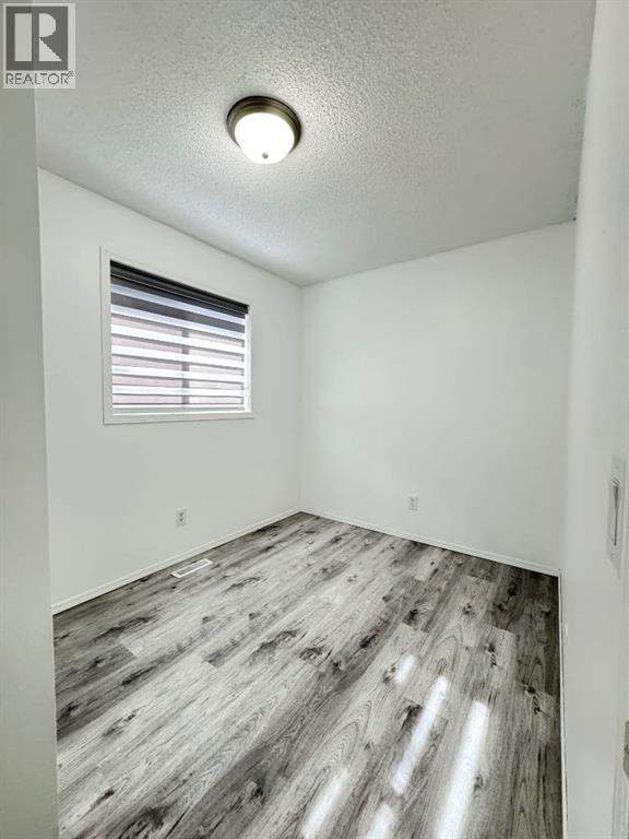98 Tarawood Road Ne, Calgary, Alberta  T3J 5B2 - Photo 5 - A2259178