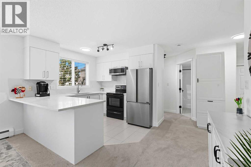 1211, 7451 Springbank Boulevard Sw, Calgary, Alberta  T3H 4K5 - Photo 2 - A2255454