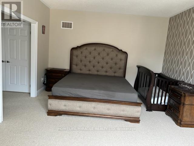 21 Camston Road, Brampton, Ontario  L6P 4K2 - Photo 6 - W12420306