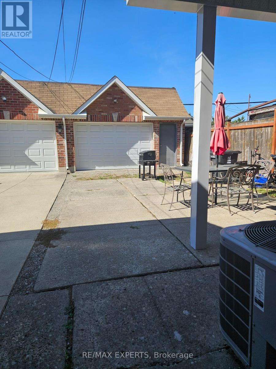 Main - 164 Prescott Avenue, Toronto, Ontario  M6N 3H1 - Photo 3 - W12420318