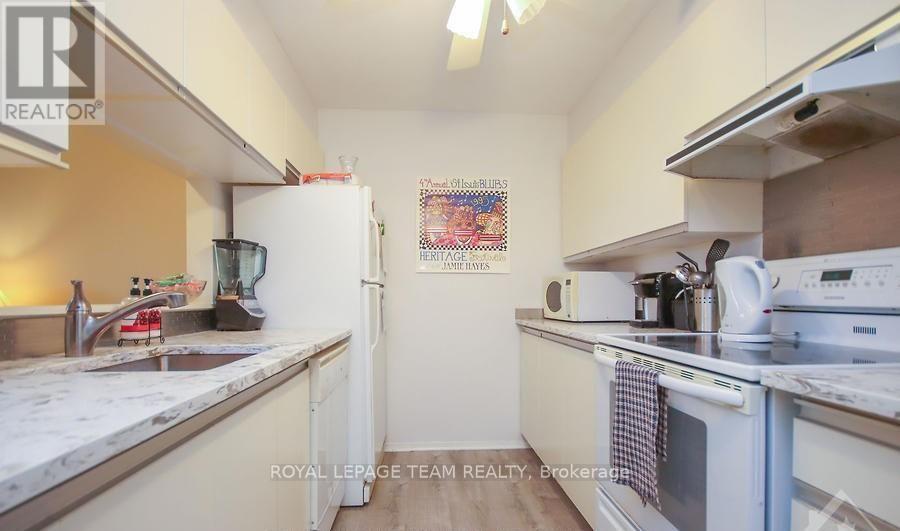 406 - 270 Brittany Drive, Ottawa, Ontario  K1K 4M3 - Photo 2 - X12420396