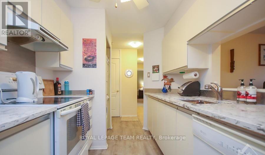 406 - 270 Brittany Drive, Ottawa, Ontario  K1K 4M3 - Photo 4 - X12420396