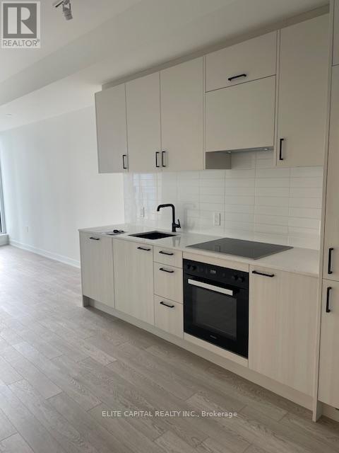 303 - 1 Kyle Lowry Road, Toronto, Ontario  M3C 0S6 - Photo 4 - C12420261
