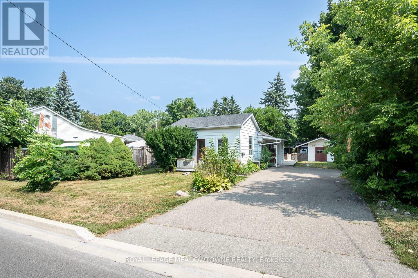 99 Commercial Street, Milton, Ontario  L9T 2J1 - Photo 1 - W12421021