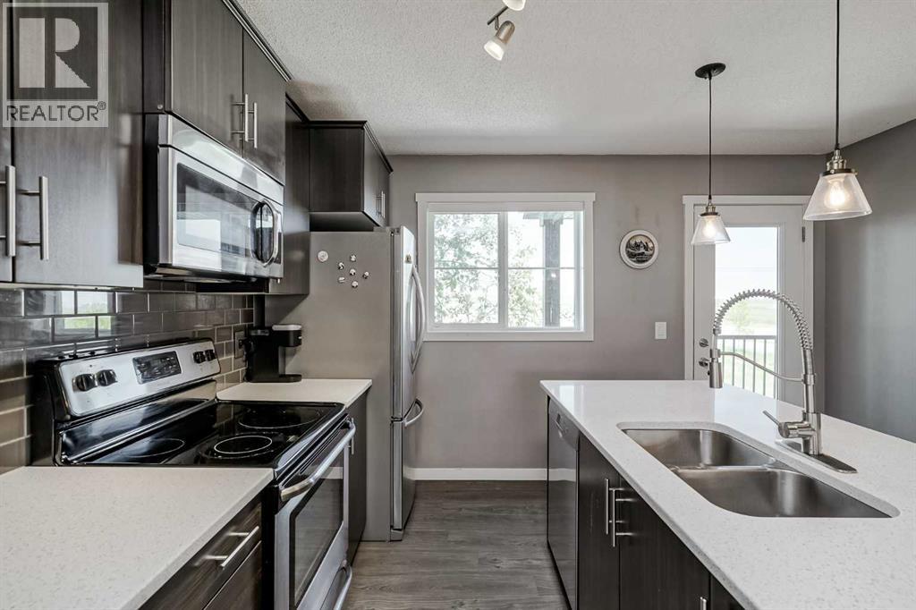 313 Copperpond Landing Se, Calgary, Alberta  T2Z 1G6 - Photo 4 - A2247411