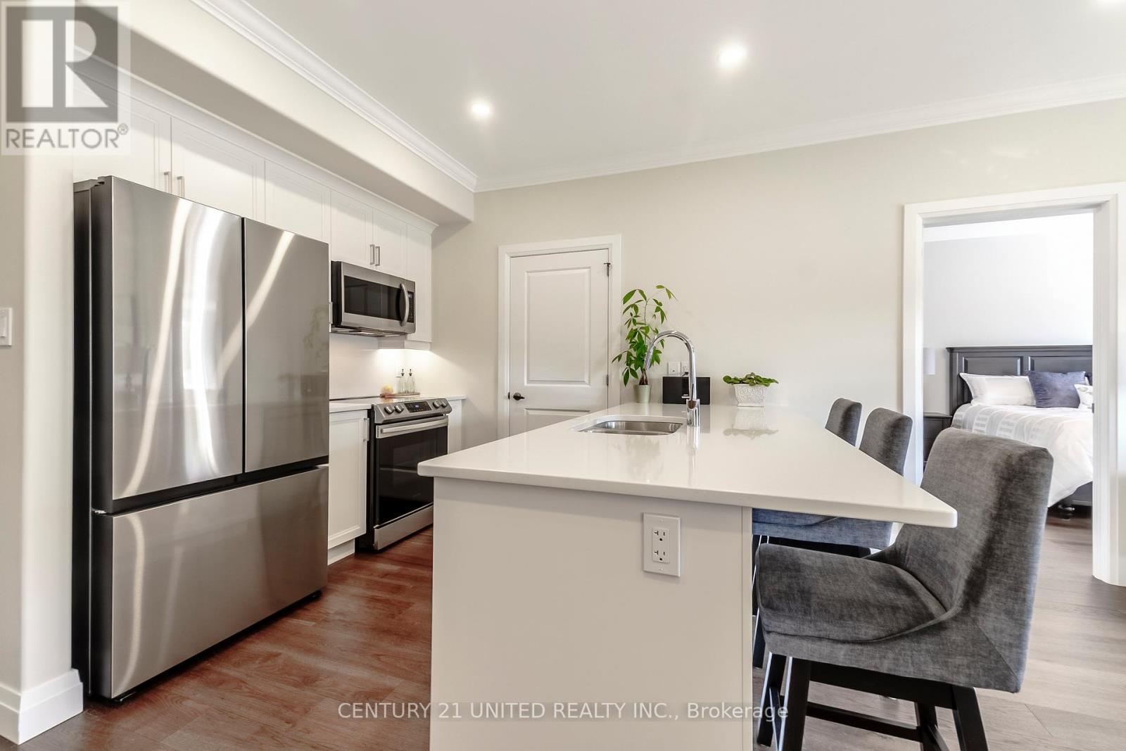 202 - 19 Hampton Lane, Selwyn, Ontario  K0L 2H0 - Photo 6 - X12421366