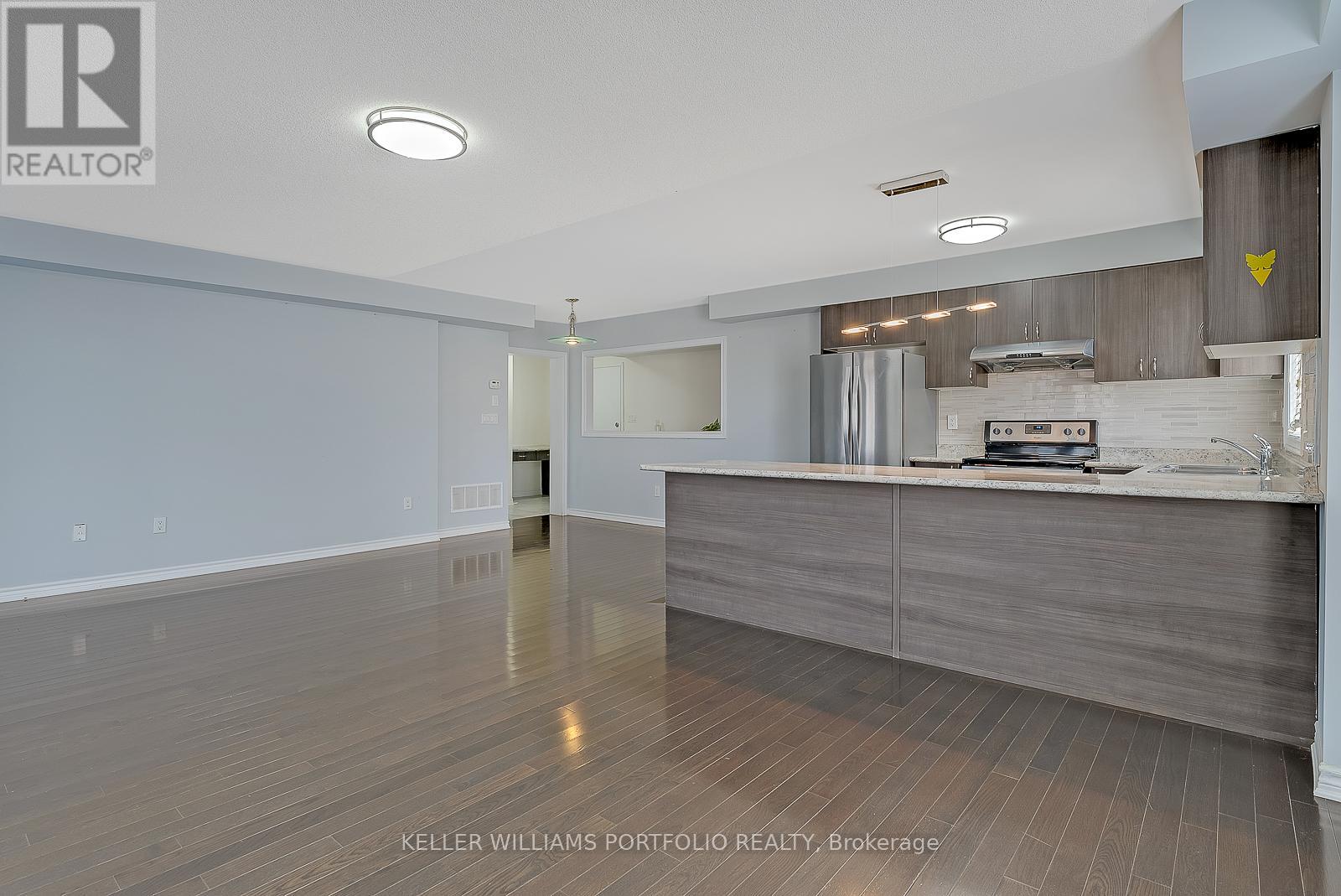 13 - 200 Veterans Drive, Brampton, Ontario  L7A 4S6 - Photo 3 - W12421180