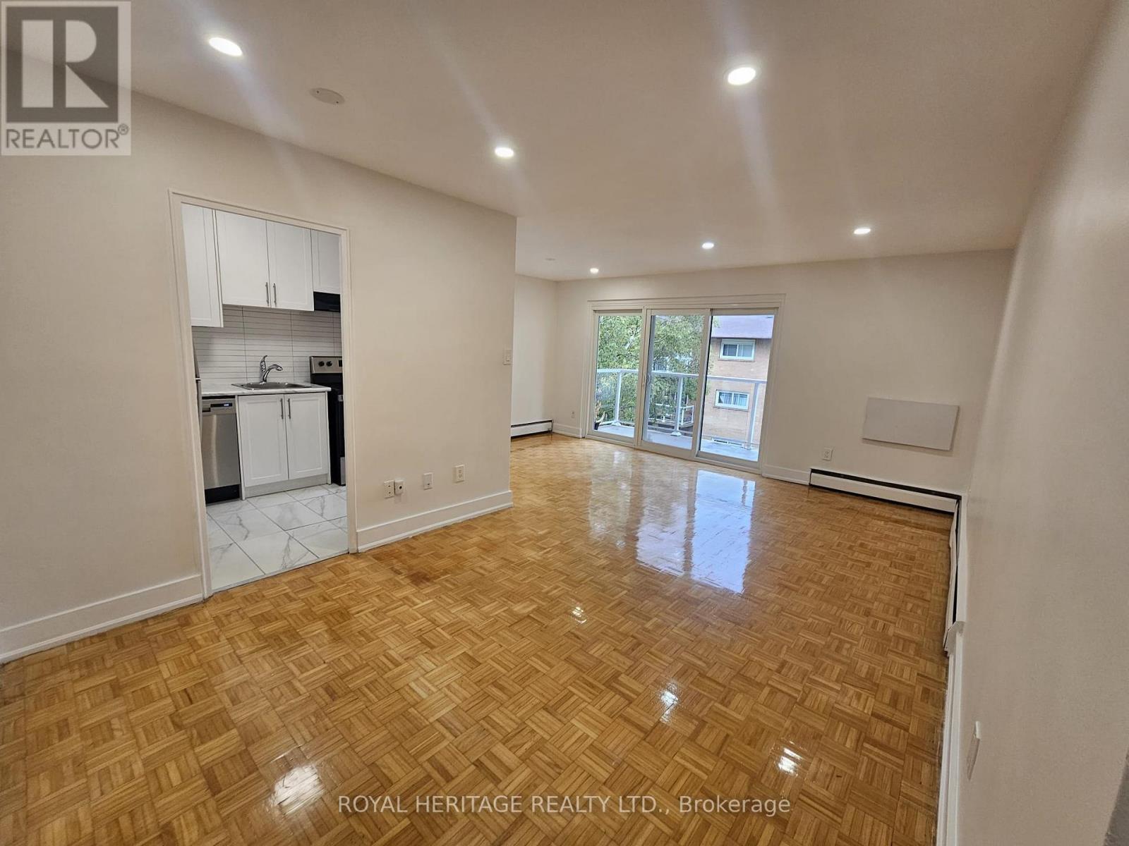 206 - 949 Simcoe Street N, Oshawa, Ontario  L1G 4W3 - Photo 2 - E12421428