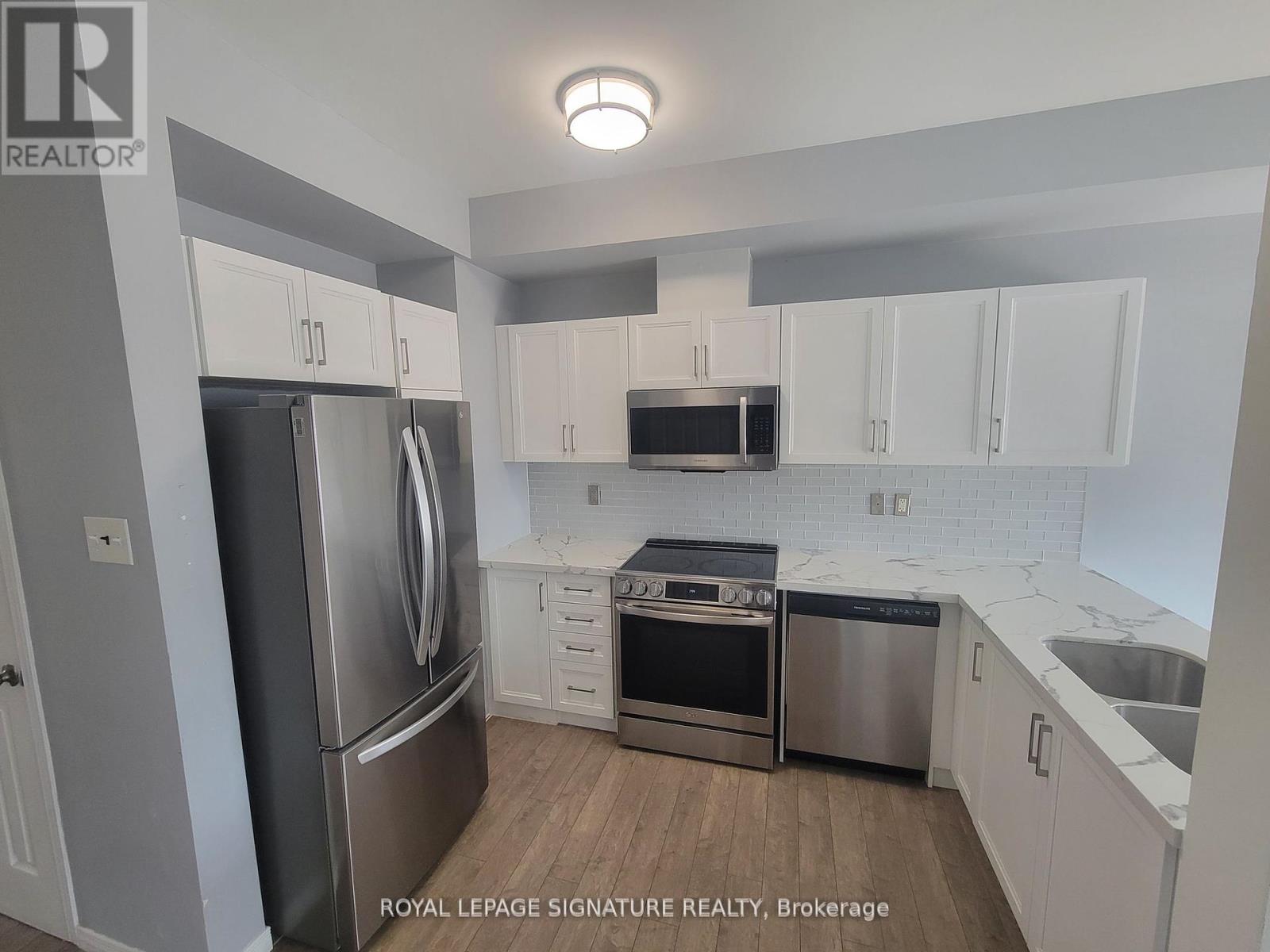 51 - 175 Stanley Street, Barrie, Ontario  L4M 0G2 - Photo 5 - S12421319
