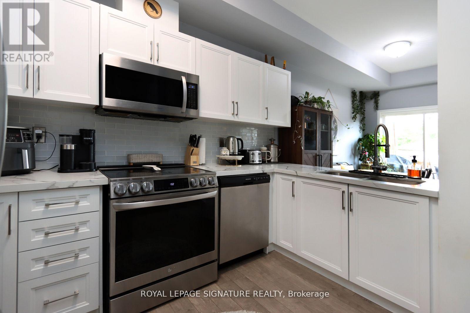 51 - 175 Stanley Street, Barrie, Ontario  L4M 0G2 - Photo 6 - S12421319