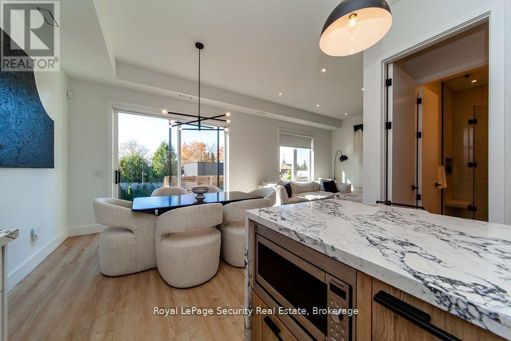 70 Chamberlain Avenue, Toronto, Ontario  M6E 4K1 - Photo 6 - W12421750