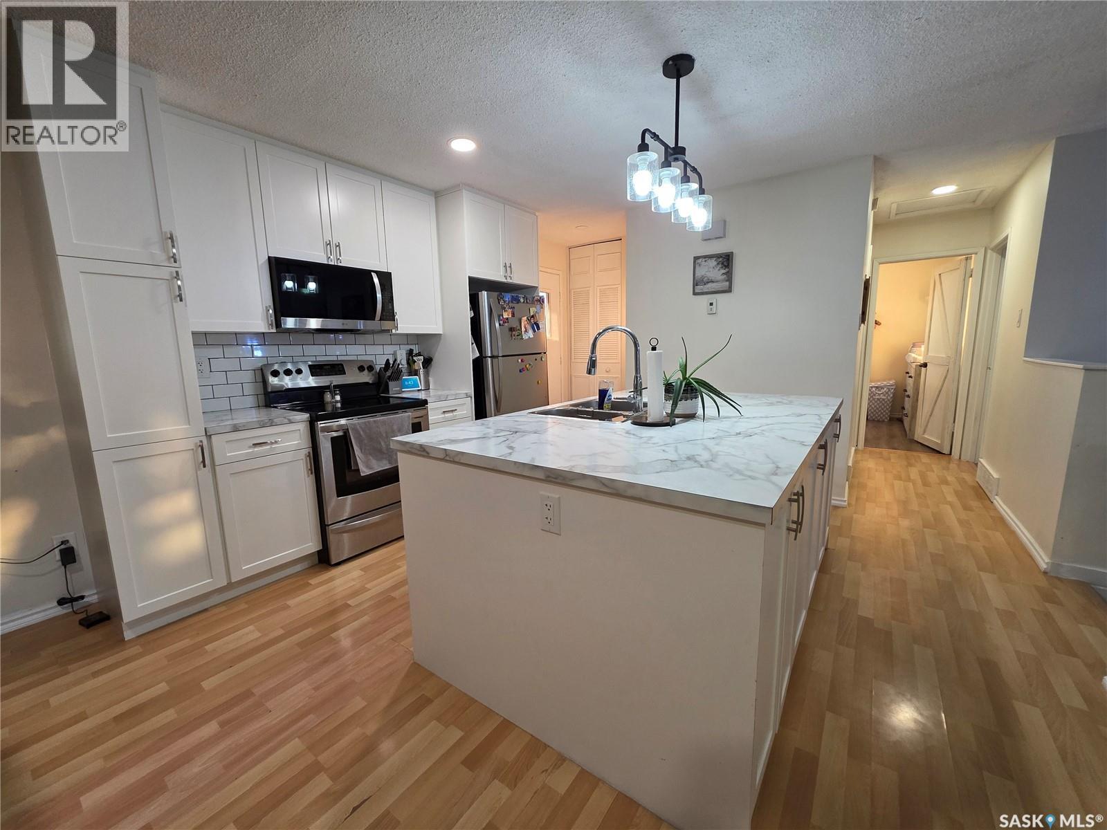 142 1st Avenue Sw, Swift Current, Saskatchewan  S9H 3H2 - Photo 6 - SK019118