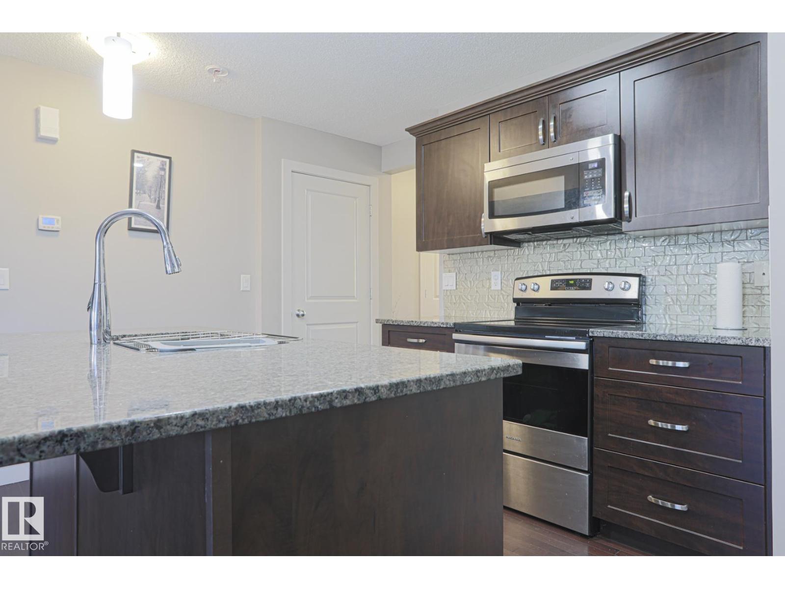 1735 Hammond Cr Nw Nw, Edmonton, Alberta  T6M 0K4 - Photo 4 - E4459096