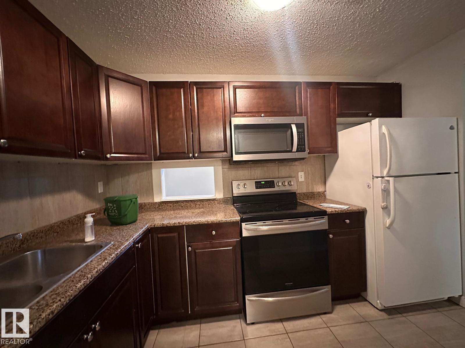 #4 3823 76 St Nw, Edmonton, Alberta  T6K 2P9 - Photo 3 - E4459126