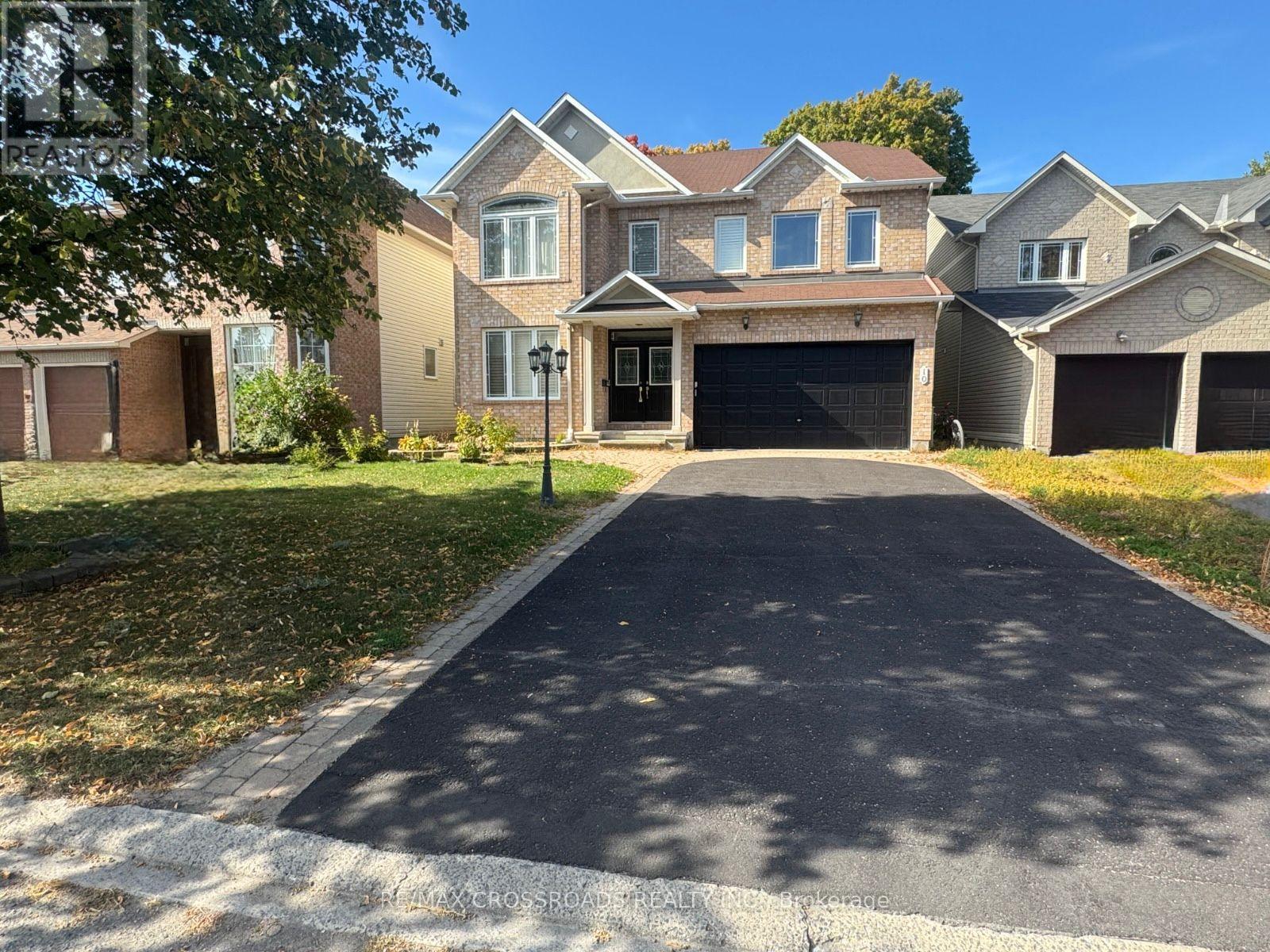 10 Tierney Drive, Ottawa, Ontario  K2J 4W2 - Photo 2 - X12298098