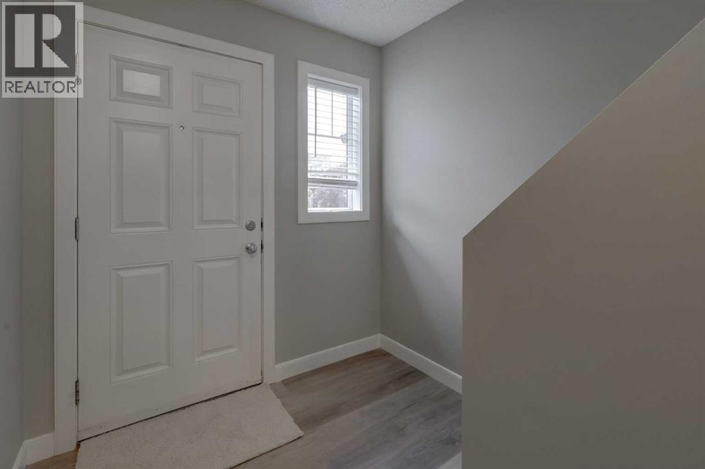169 Pantego Lane Nw, Calgary, Alberta  T3K 0T1 - Photo 2 - A2241456