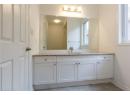 Bathroom featuring vanity and light tile patterned floors
