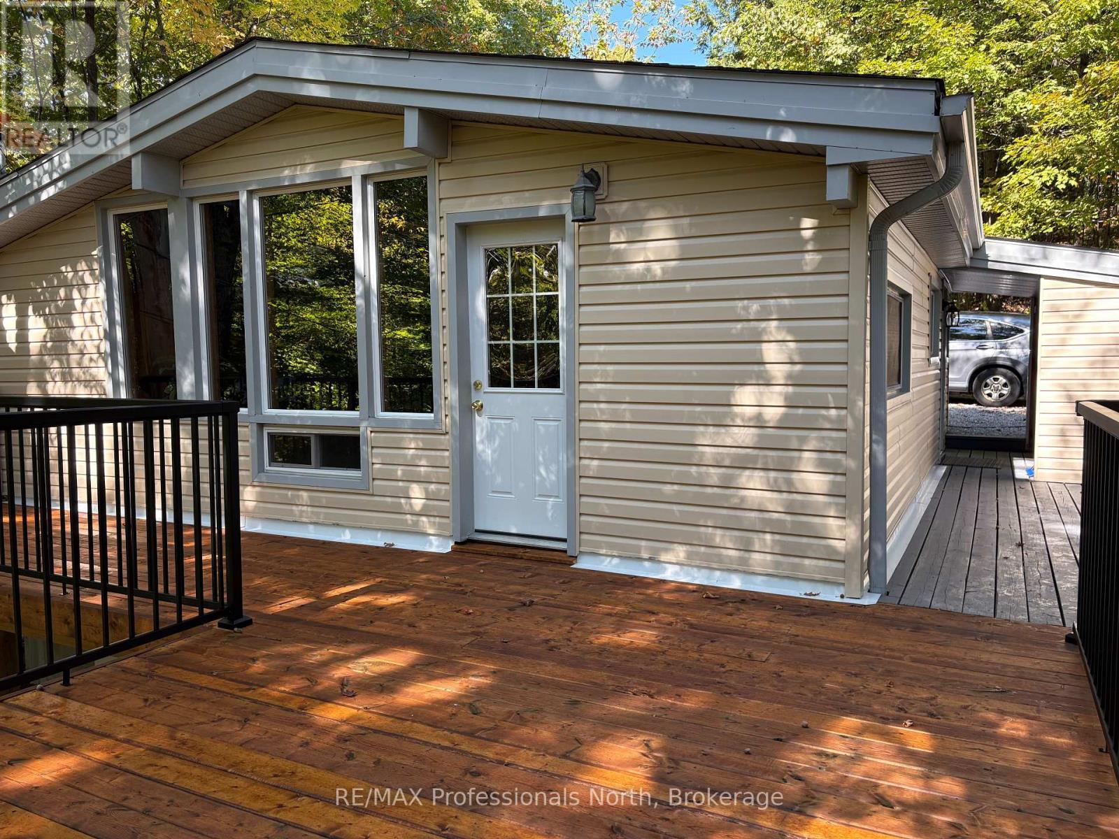 116 Woodland Drive, Huntsville, Ontario  P1H 1A7 - Photo 6 - X12423156