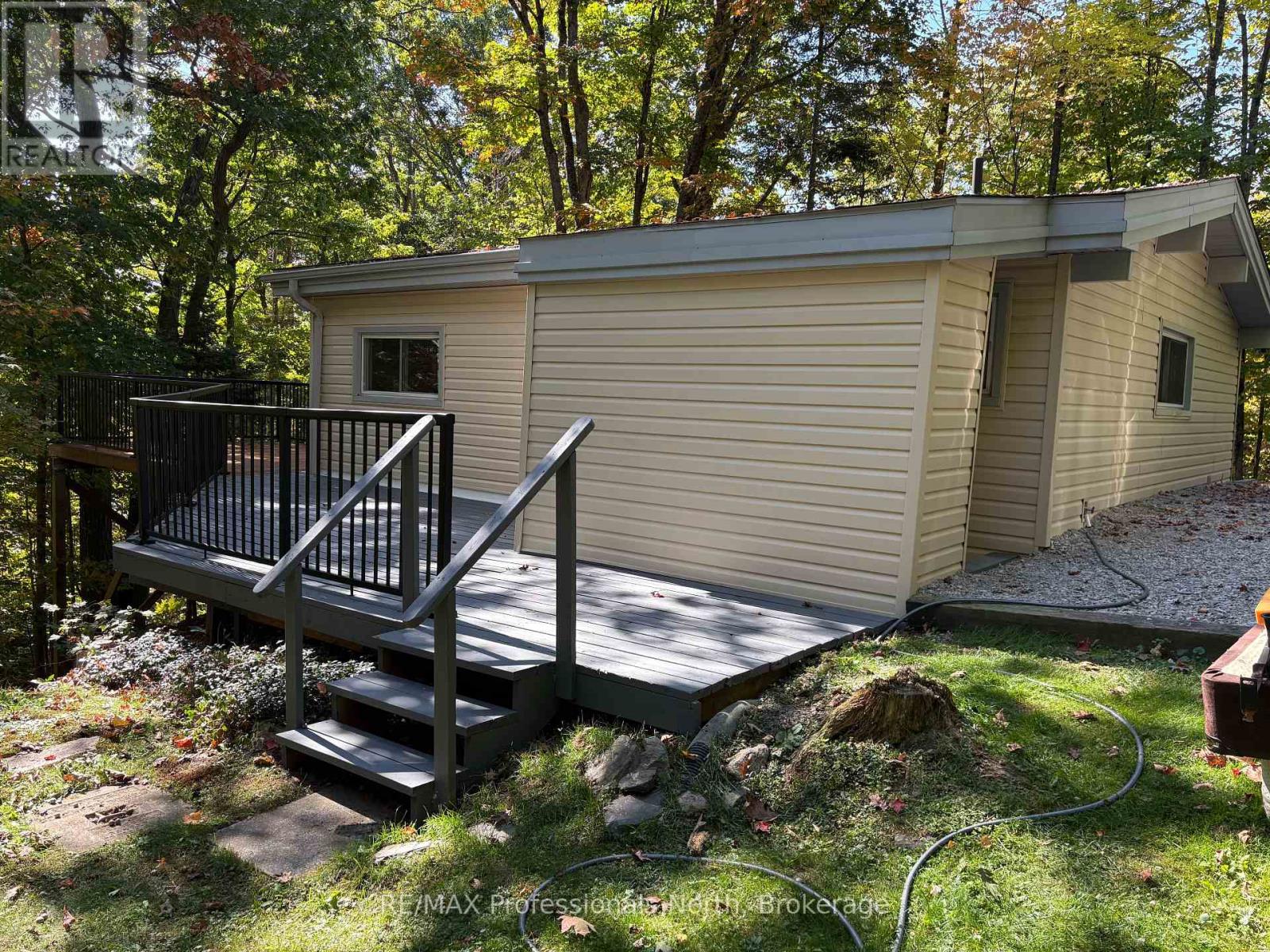 116 Woodland Drive, Huntsville, Ontario  P1H 1A7 - Photo 9 - X12423156