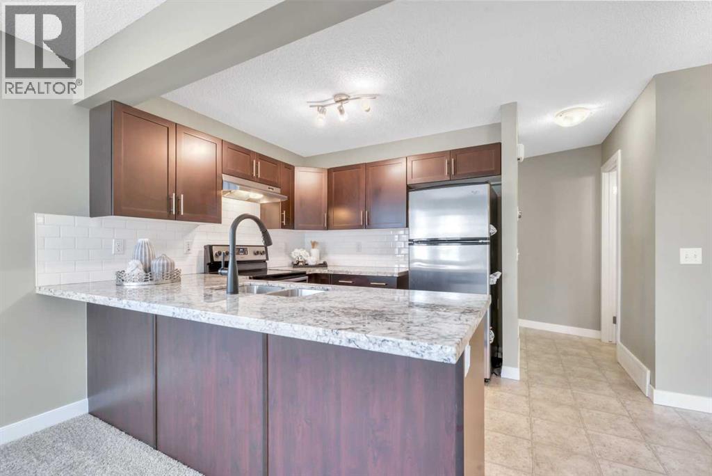 236 Pantego Lane Nw, Calgary, Alberta  T3K 0T1 - Photo 6 - A2248426