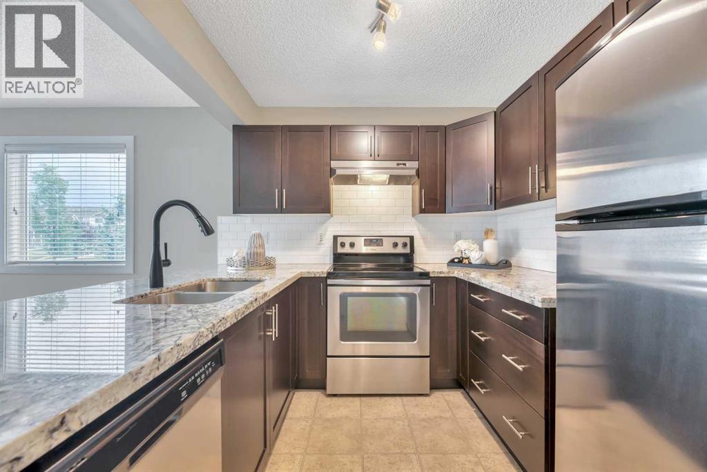 236 Pantego Lane Nw, Calgary, Alberta  T3K 0T1 - Photo 7 - A2248426