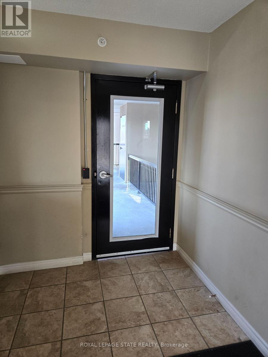 305 - 1390 Main Street E, Milton, Ontario  L9T 7S9 - Photo 2 - W12423203
