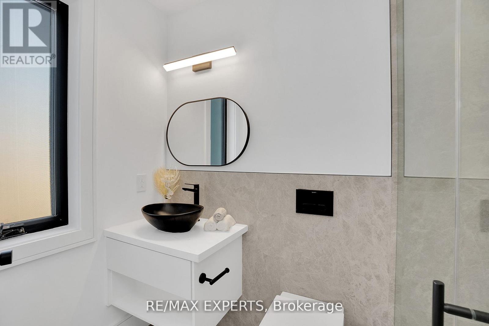 62 Hartley Avenue, Toronto, Ontario  M6E 4E8 - Photo 33 - W12423317