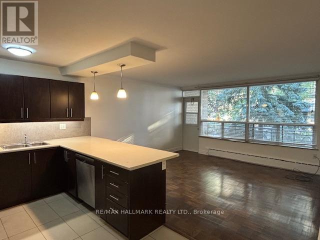 210 - 134 Lawton Boulevard, Toronto, Ontario  M4V 2A4 - Photo 2 - C12423404