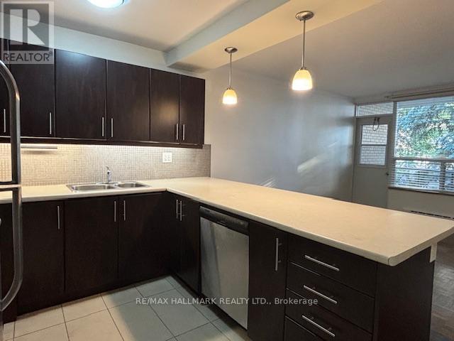210 - 134 Lawton Boulevard, Toronto, Ontario  M4V 2A4 - Photo 4 - C12423404