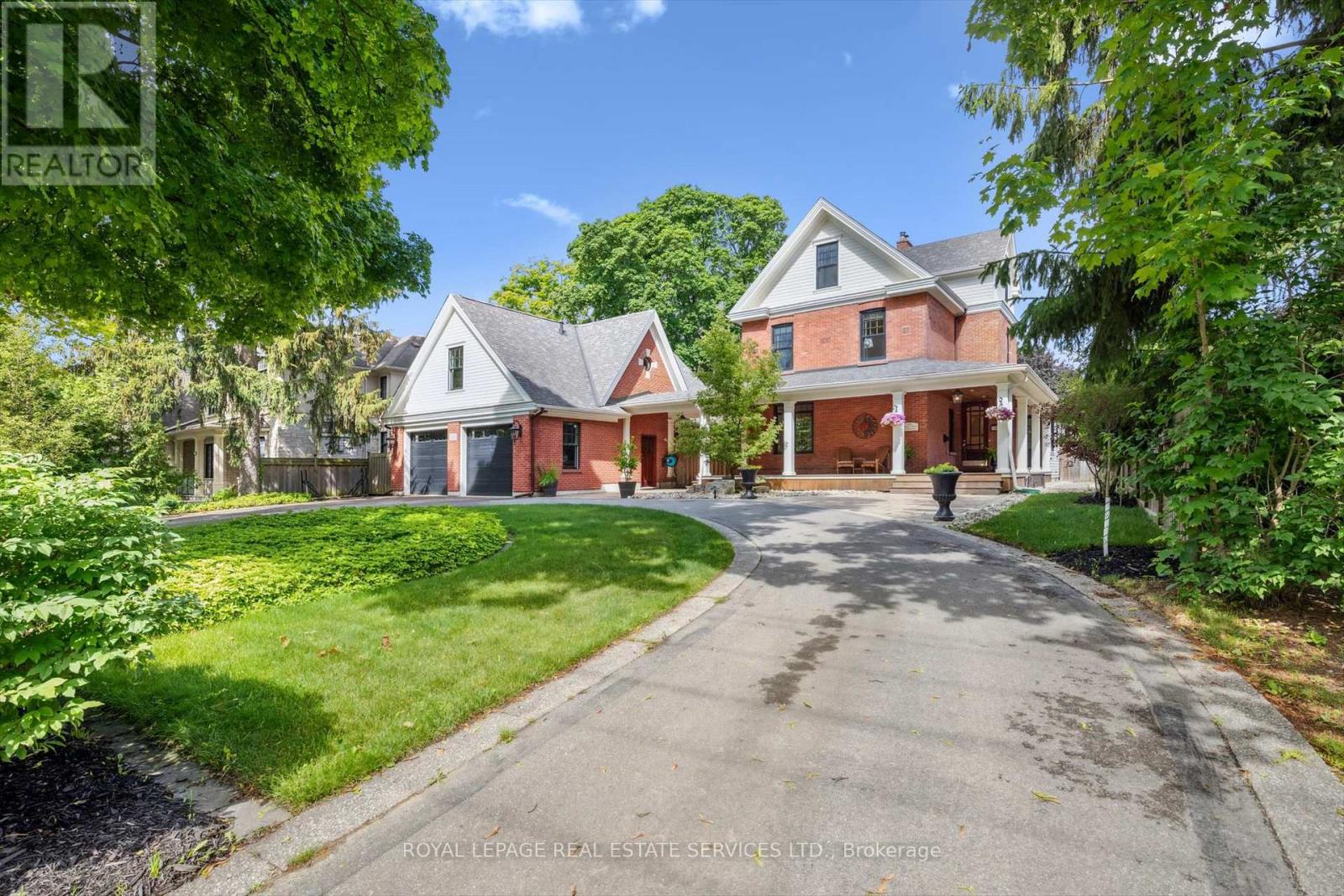 335 Lakeshore Road W, Oakville, Ontario  L6K 1G3 - Photo 2 - W12423548