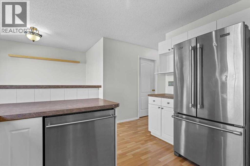 911 Arbour Lake Road Nw, Calgary, Alberta  T3G 4Z9 - Photo 11 - A2259679