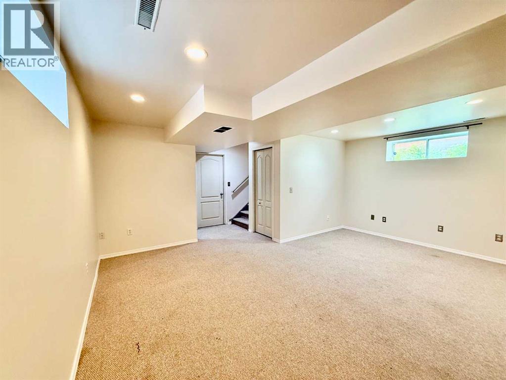 911 Arbour Lake Road Nw, Calgary, Alberta  T3G 4Z9 - Photo 24 - A2259679