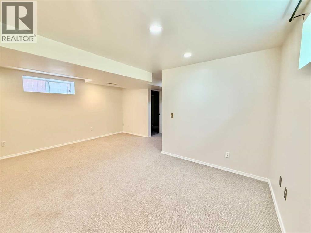 911 Arbour Lake Road Nw, Calgary, Alberta  T3G 4Z9 - Photo 25 - A2259679