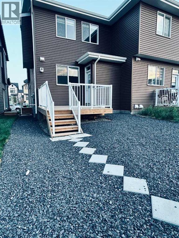90 Aquila Drive Nw, Calgary, Alberta  T3R 2C4 - Photo 2 - A2198238