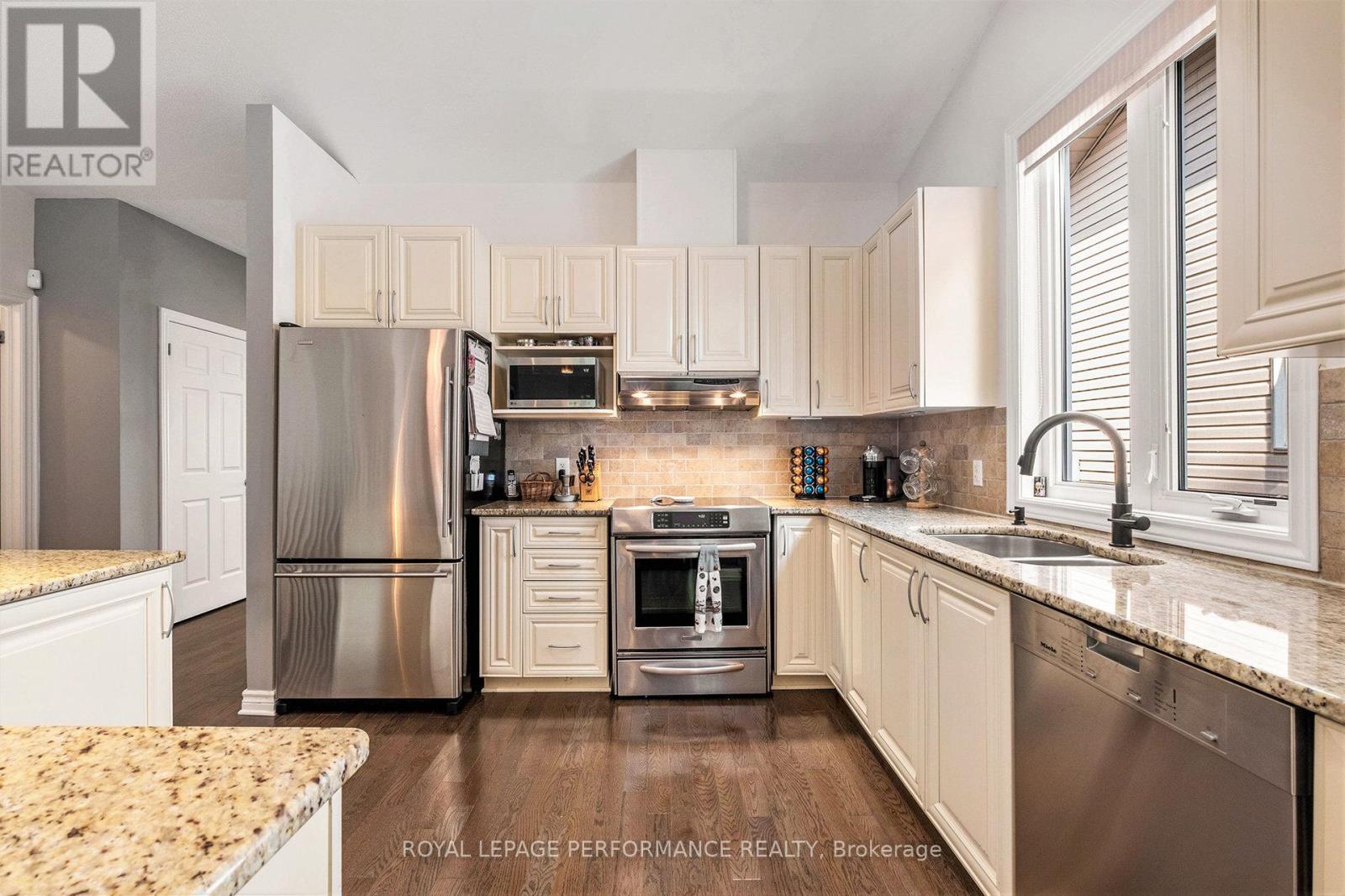 414 Statewood Drive, Ottawa, Ontario  K2K 0B7 - Photo 2 - X12388555