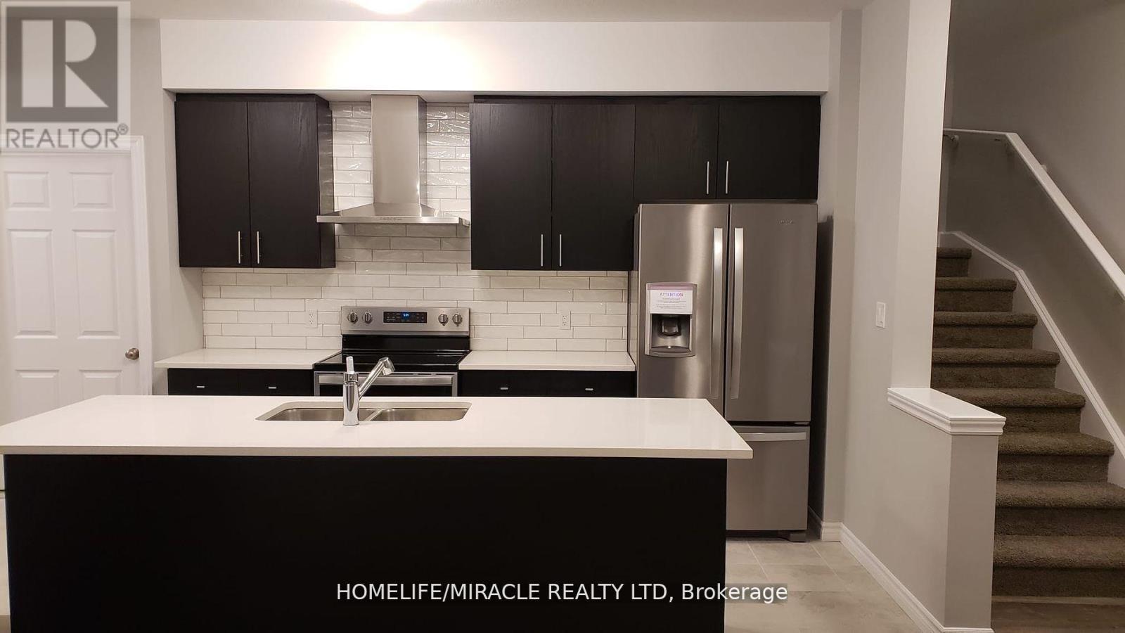 38 Oat Lane, Kitchener, Ontario  N2R 0T1 - Photo 2 - X12424322