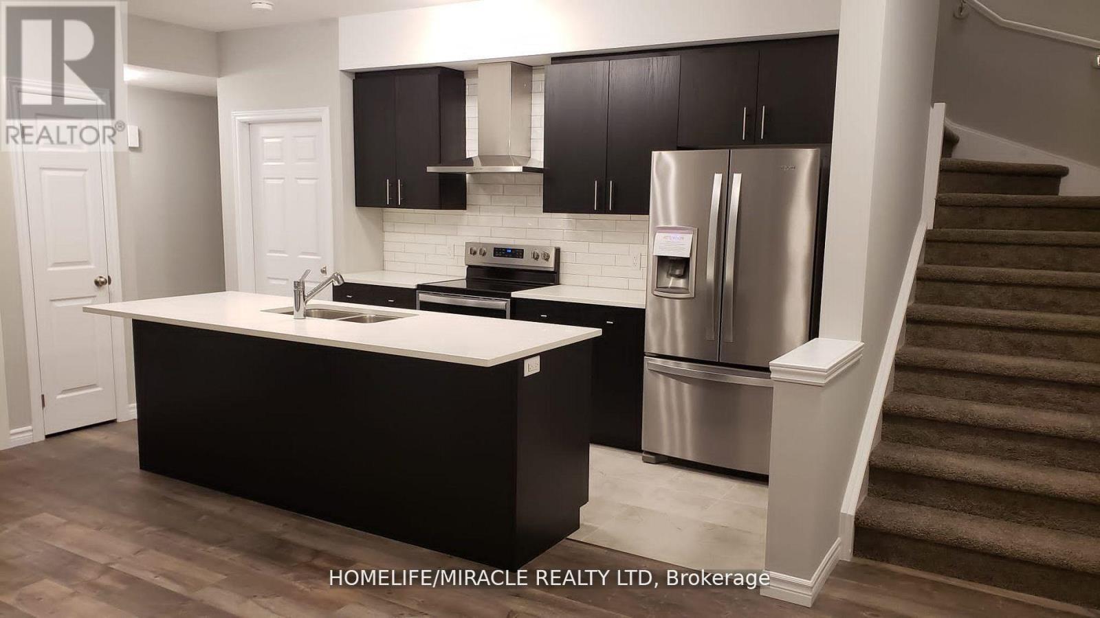 38 Oat Lane, Kitchener, Ontario  N2R 0T1 - Photo 3 - X12424322