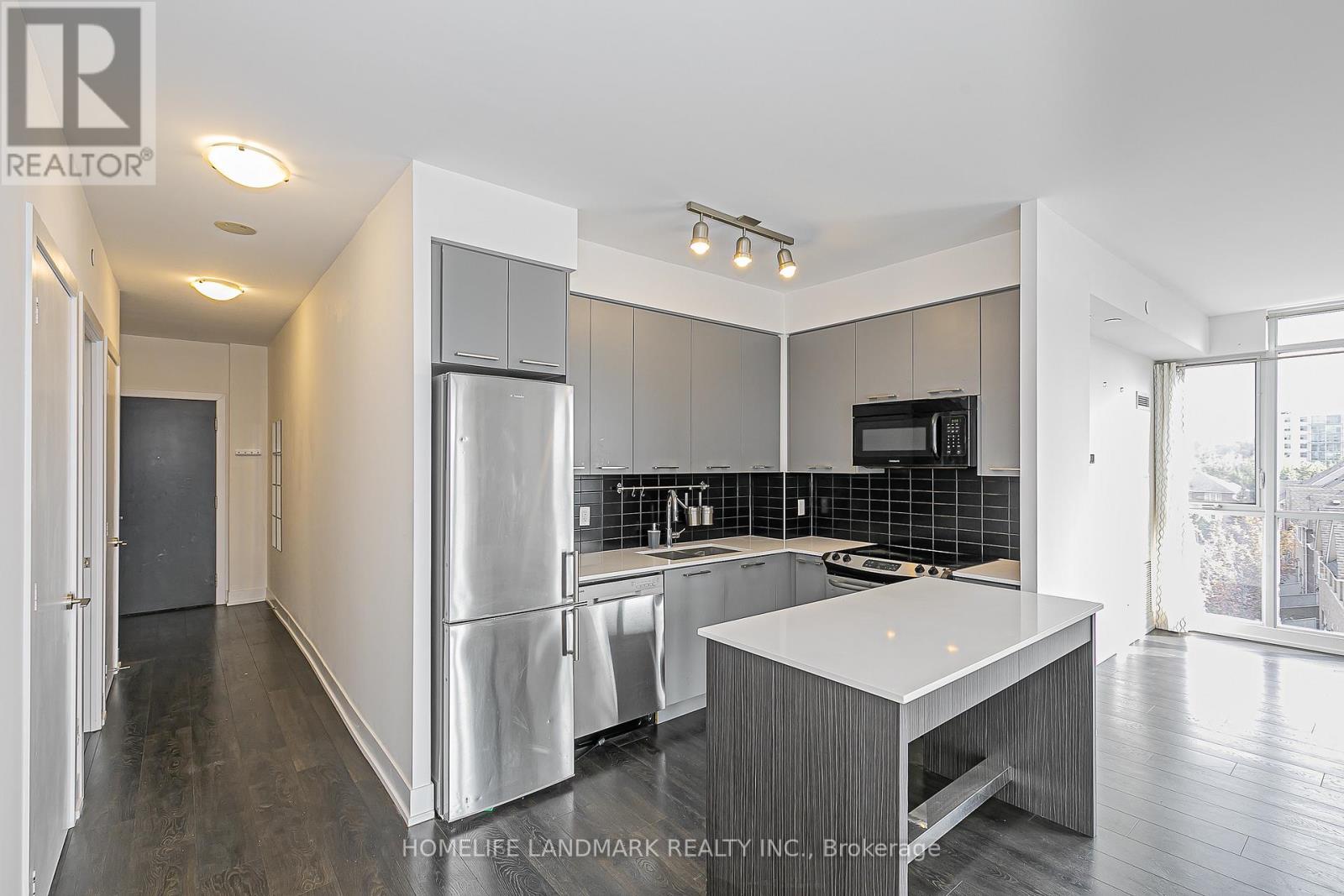 503 - 9471 Yonge Street, Richmond Hill, Ontario  L4C 0Z5 - Photo 4 - N12424399