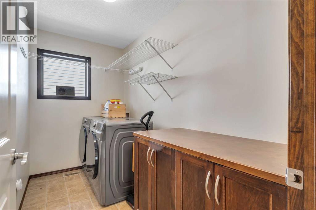 126 Tuscany Summit Heath Nw, Calgary, Alberta  T3L 0B9 - Photo 25 - A2255201
