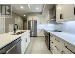 209 - 71 WYNDHAM STREET S