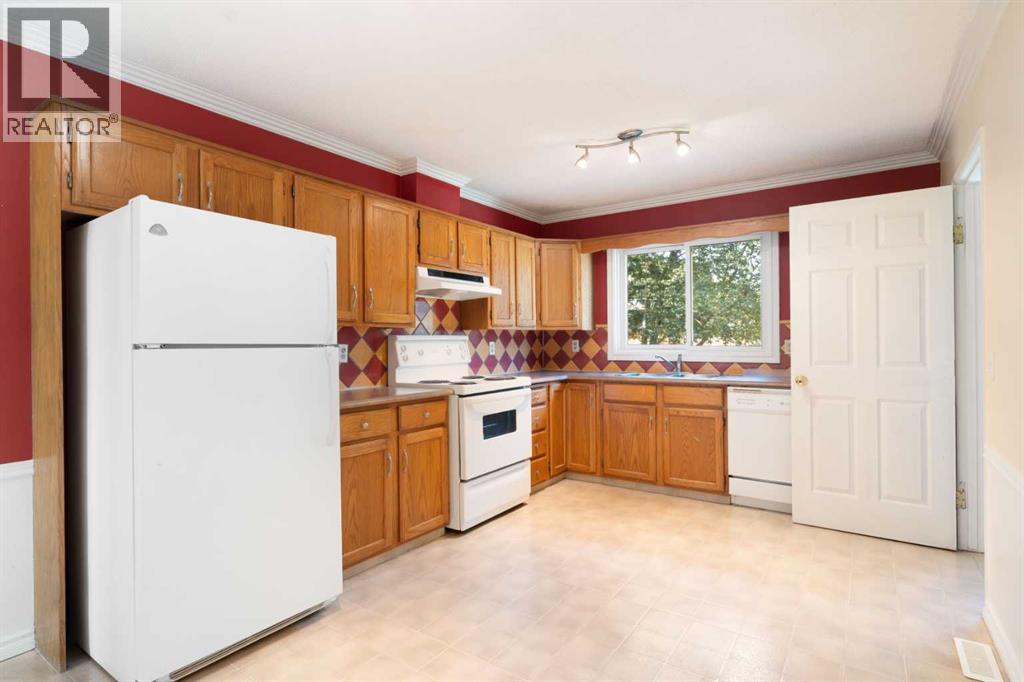 39 Bearberry Crescent Nw, Calgary, Alberta  T3K 1P9 - Photo 15 - A2258760