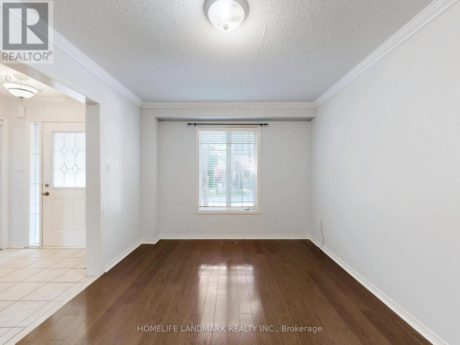 60 Cariglia Trail, Markham, Ontario  L3R 4W8 - Photo 4 - N12424669