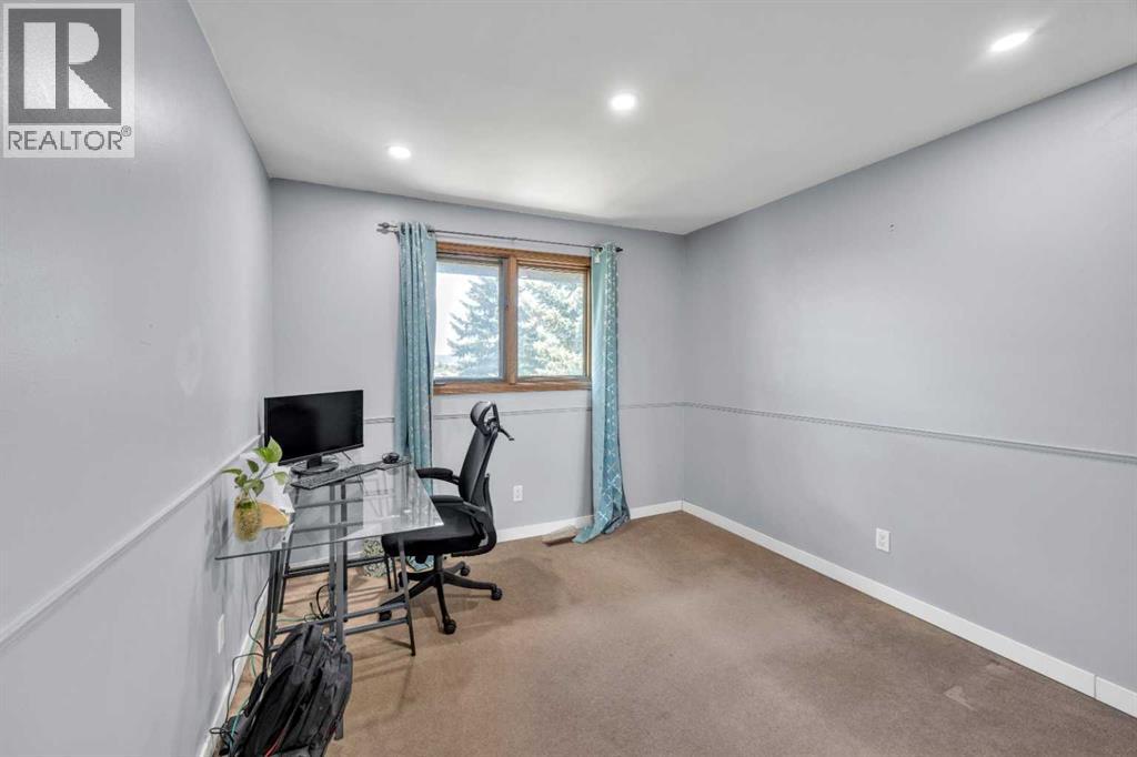 303 Ranchridge Bay Nw, Calgary, Alberta  T3G 1V5 - Photo 27 - A2240643