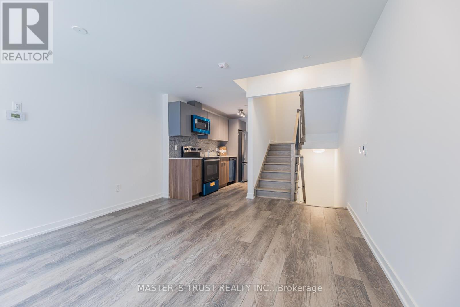 54 - 10 Calamint Lane, Toronto, Ontario  M1W 2H1 - Photo 9 - N12425125