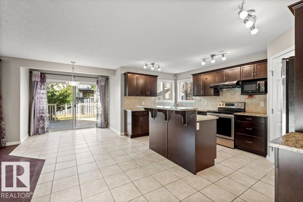 7011 Strom Ln Nw, Edmonton, Alberta  T6R 0T1 - Photo 12 - E4459317