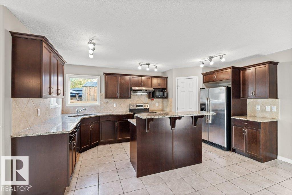 7011 Strom Ln Nw, Edmonton, Alberta  T6R 0T1 - Photo 13 - E4459317