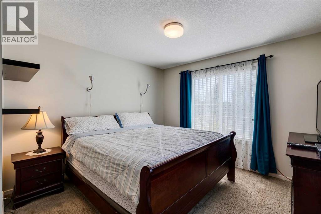8 Kinlea Common Nw, Calgary, Alberta  T3K 3Z5 - Photo 17 - A2259897