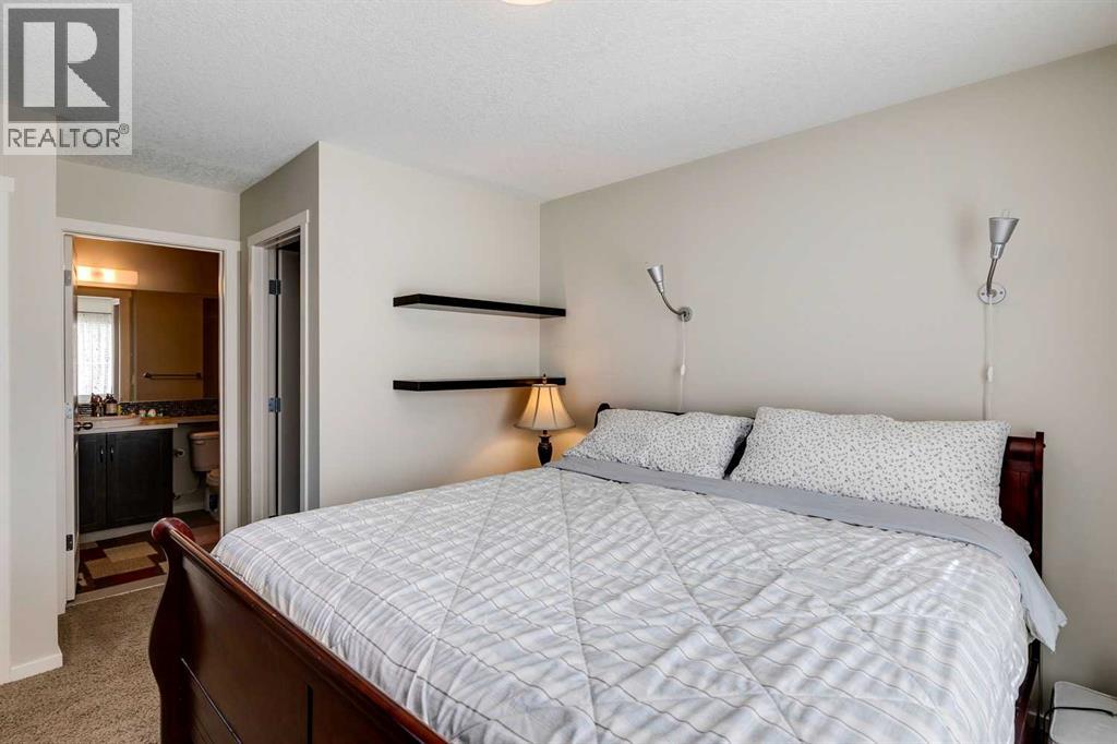 8 Kinlea Common Nw, Calgary, Alberta  T3K 3Z5 - Photo 18 - A2259897